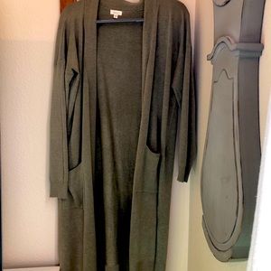 Olive green long sweater w/pockets. Size Large